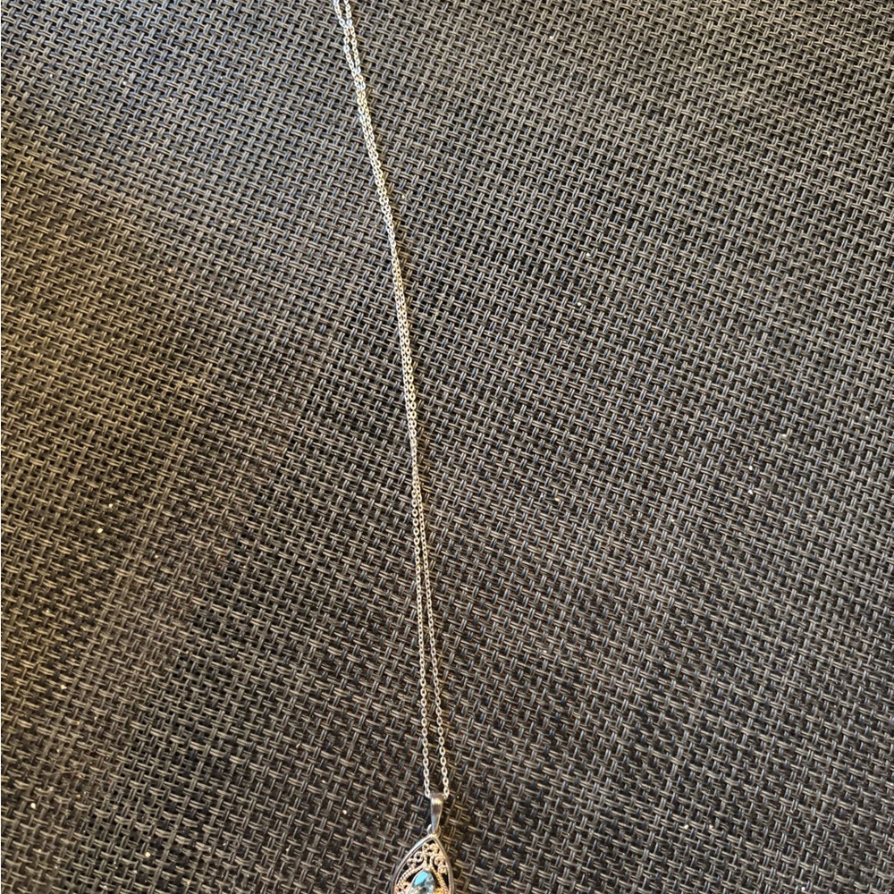 Silver Teardrop Pendant Necklace with aquamarine stone